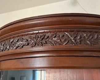 Antique carved mahogany bookcase with curved center section 76"h x 70"w x 23"d