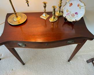 Vintage flip-top mahogany table                                              29"h x 36"w x 18"d 