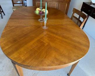 Kindel dining table 29"h x 54" long x 44" w                       plus 3 16" leaves - total potential length 102"