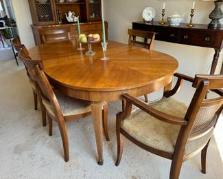 Kindel dining table 29"h x 54" long x 44" w                       plus 3 16" leaves - total potential length 102"