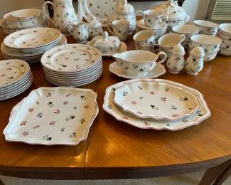 Large set Villeroy & Boch "Petite Fleur" china 5 dinner plates
2 lg. rimmed soup bowls
8 salad plates
7 bread plates
5 cups
8 saucers
1 mug
3 cereal (?) bowls
5 berry bowls
2 lg. serving bowls
1 rice (?) bowl
butter dish
gravy boat
salt/pepper
sugar/creamer
teapot 
coffee pot
2 small oval platters
square plate 
covered casserole
