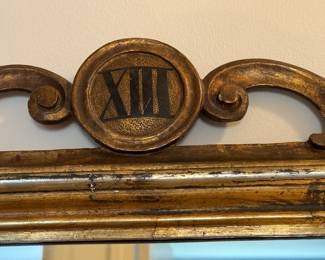Antique gilt mirror numbered XIII     22"w x 21"h 