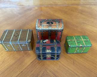 collection of small biscuit tins