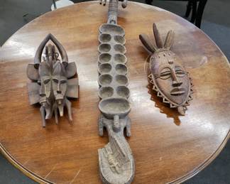 Senufu Maskes and a Crocodile-Motif Mancala Game