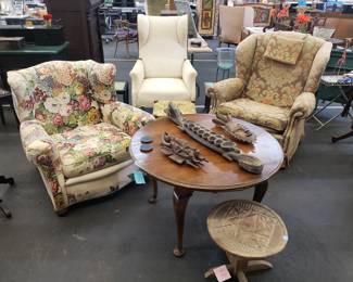 Vintage Wingback Chairs; Round Maple Coffee Table; African Primitive Carvings
