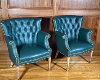 PAIR TUFTED GREEN LEATHER LIBRARY CHAIRS | Recent green leather upholstery with brass tacks on antique frames