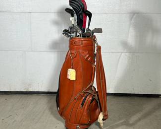 RON MILLER LEATHER GOLF BAG & CLUBS | Includes: Ron Miller Made in USA leather gold bag, Lynx LX3 driver, Spalding Top-Flite 3 & 5, Lynx LXW 52 sand wedge, Renewal PowerBilt 55 degree sand wedge, and MacGregor VIP 3, 4, 5, 6, 7, and 8 irons