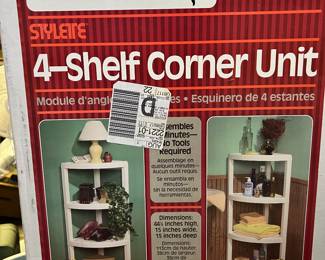 Four shelf corner unit