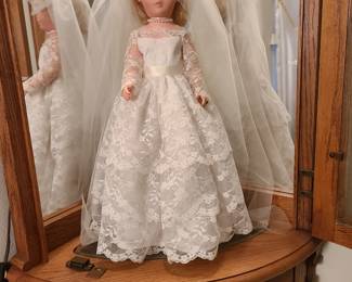 Handmade Bridal dress  on doll..
Lighted Display Cabinet for sale also
Display cabinet