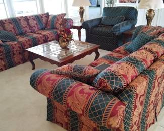 Two matching custom Massoud sofas.