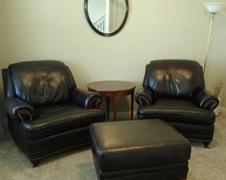 LEATHER CHAIRS BLACK AND MATCHING OTTOMANS 