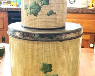 Two (2) Decoware Tins
