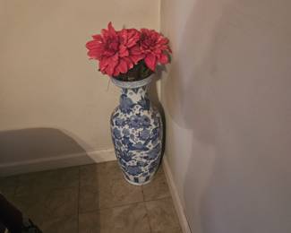 2 of these tall vases located in front room