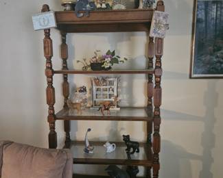 Glass shelves and items on it for sale. 
