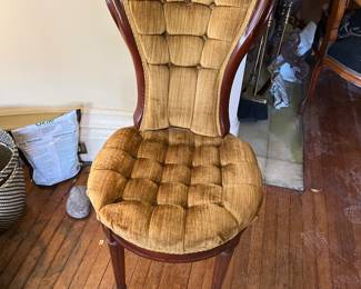 Antique tufted chair