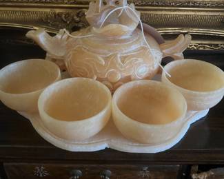 Carved marble teapot and cups