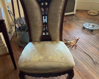 Antique chair with cut out design