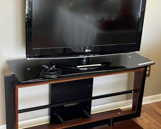 LG Flatscreen TV with Smokey glass stand (two shelves not pictured)