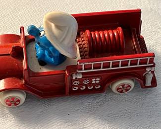 Vintage Erti Smurf in die cast fire truck 