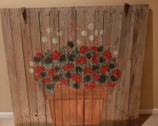Large and impressive. Hand painted floral design on old barnwood.