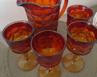 1970's Tiara (Indiana Glass) Amberina Sunset (red and yellow) water pitcher and four goblets. Excellent condition.