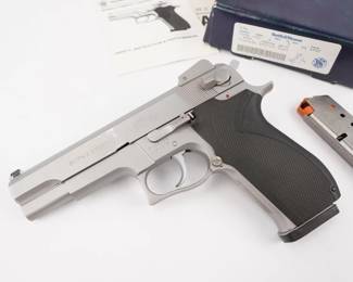 Make: Smith & Wesson
Model: 4506
Caliber: .45 Auto
Action: Semi
Barrel: 5
Bore: Shiny
Serial # TCU8136
Condition: Excellent
Smith & Wesson model 4506 a 8 shot 45 ACP, third generation Smith & Wesson auto loader. It has a 5” barrel. The finish is stainless. It has a slide mounted safety, it operates as a double action single action pistol. The pistol looks either new or new. Has original cardboard box, two 8 shot magazines included. The rifling is sharp and shiny.