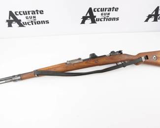Make: Mauser Werke
Model: 98 Sniper Rifle
Caliber: 8MM
Action: Bolt
Barrel: 24
Bore: Bright
Serial # 2970
Condition: Very Good
BYF Mauser Werke Sniper Rifle action/barrel, non-matching Serial #2970 , Bolt Serial #1982,modified for scope, Pre-war Scope Serial #21528 Skopar Beta, Single Post & Crosshair Reticle, Post-war high turret scope mount. Most early war scopes used were originally hunting scopes until scope production began. Rifle features an original sling and cleaning rod. Firing Proof Nazi-style eagles, Acceptance Stamps waffenamts w/Nazi-style eagles. Stock type laminated, stock finish polished and stained, cupped buttplate total number produced 336,441. Rifle is not an RC or import marked, great bore and rifling.