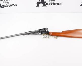 Make: A. Uberti
Model: Carbine
Caliber: .44 CAL
Action: SA
Barrel: 18
Bore: Shiny
Serial # 95380
Condition: Excellent
This is one of the first cap and ball revolving carbines. The easy handling and reliability of this carbine makes it a pleasure to shoot. About 3,000 original guns were produced between 1866 and 1879. This authentic reproduction is in 44 caliber with an 18" tapered octagon barrel, blue steel frame, brass trigger guard, 6-shot cylinder, adjustable rear sight and walnut stock. This Rifle is in Excellent condition showing some light scratches on the stock and normal signs of use and wear.