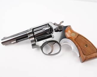Make: Smith & Wesson
Model: 10-6
Caliber: .38 Spl +P
Action: DA
Barrel: 4
Bore: Shiny
Serial # D579292
Condition: Excellent
Smith & Wesson model 10-6, six shot, 38 speacial, on a K frame, double action single action revolver. The revolver sports a tyler T grip, with factory wood stocks, in a square butt revolver. The barrel is 4 inch havey barrel. The finish is a blued finish. The left side of the fram is marked with the initials “SCHD”. The revolver show signs of use, most likly police or corrections use, with the frame engraving. The revolver is in working order. 