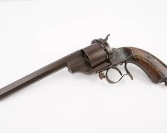 Make: Lefaucheux
Model: 1854
Caliber: NM
Action: SA
Barrel: 6.25
Bore: Dark
Serial # 25659
Condition: Good
In 1854, Frenchman Eugene Lefaucheux introduced the Lefaucheux Model 1854, notable as being the first revolver to use self-contained metallic cartridges rather than loose powder, pistol ball, and percussion caps. The M1854 model was a single-action, pinfire revolver holding six rounds. Appears to be missing ejector Rod and a thumb screw. This Revolver is in overall Good condition for its age. 