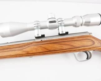 Make: Marlin
Model: 983S
Caliber: 22 WIN MAG
Action: Bolt
Barrel: 22
Bore: Bright
Serial # 97705119
Condition: Excellent
The two-toned stock and stainless action and barrel really makes this rifle stand out in the rack, giving it a plus for eye appeal. Even with its 22-inch barrel, the bolt action still weighed in at 6 pounds-with a good heft and balance. This Bolt action Rifle is paired with a Barska scope and is in overall excellent condition with a bright bore.