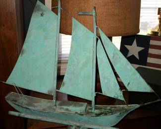 Teal and Silver Metal Ship