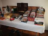 DVD's, Cassettes, CD's, Movies, Stainless Silverware in Case & Miscl. Items.