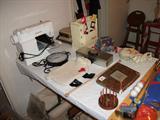 Singer Sewing Machine, Clock, & Miscl. Sewing & Knitting Items.