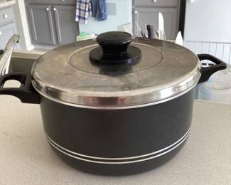 Pan with non stick lining & lid.  Measures 10” x 5”.