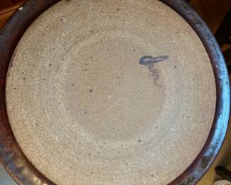 Signed pottery plate