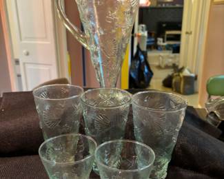 Pitcher and assorted glasses in beach pattern