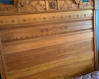 Antique chestnut wood bed headboard