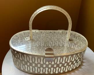 Metal and plastic handbag