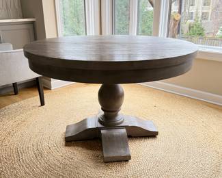 Pottery Barn Weathered Wood Pedestal Dining Table. Measures 48" D x 31" H with 26" Clearance. Photo 1 of 4.