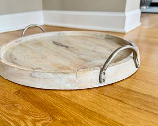 Rustic Round Wood Charcuterie Board with Metal Handles. Measures 19.5" D. Photo 1 of 3.
