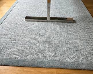 Wool Rug. Measures 5' x 8.'