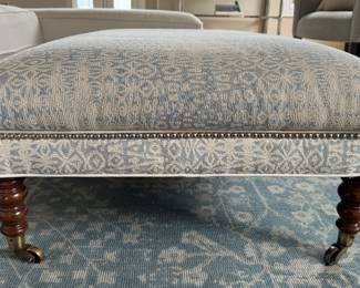 Custom Blue & White Upholstered Down-Filled Ottoman with Barley Twist Legs on Casters and Nailhead Trim. Measures 29" x 40" x 16" H. Photo 1 of 4.
