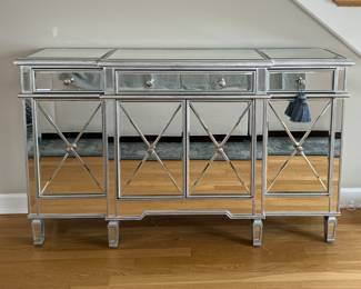 Mirrored Glass Sideboard With Silver Frame and Grey Interior. Includes 3 Drawers and 2 Cabinets With Shelves. Measures 60" W x 14" D x 36" H. Photo 1 of 4.