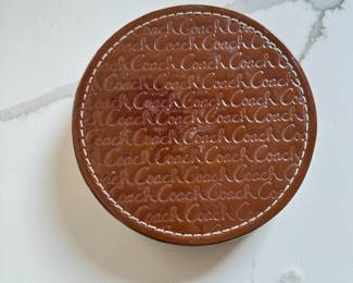 Set of 4 Coach Leather Coasters.