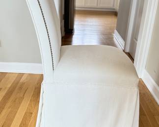 Pair of Custom Parsons-Style Skirted Dining Chairs with Nailhead Trim on Casters. Each Measures 21" W x 26" D x 40" H with 19" Seat Height. Photo 3 of 7.