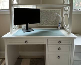 White Desk with Optional Hutch Accessory. Desk Measures 48" W x 22" D; Hutch is 48" W x 16" D x 31" H. Photo 1 of 2.
