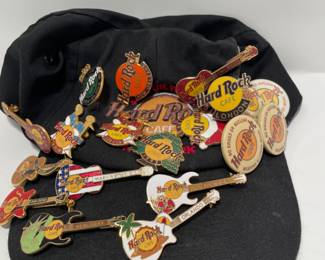 Hard Rock Cafe cap & 21 pins -$20