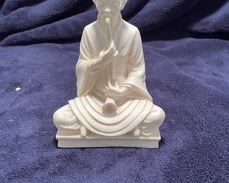 Alabaster resin statue man playing horn -$45