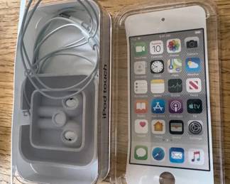 Apple products including chargers, iPod Shuffle, USB Super Drive, iPad Air
